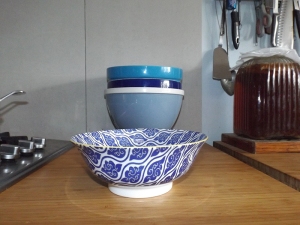 Narfs pretty new bowl and in the background a selection of mixing bowls designed to encourage me to make cake...