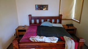 Our bed and the two bedside tables that we inherited